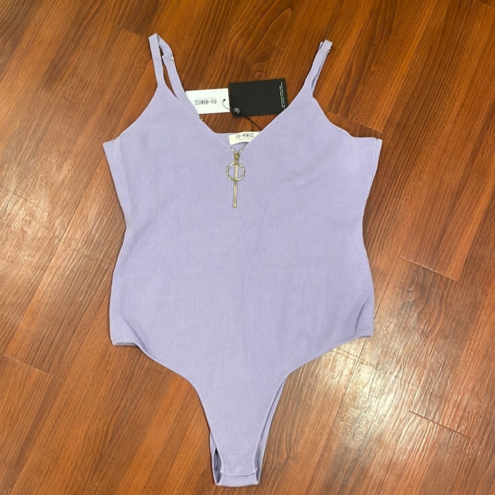 4th Reckless Purple Body suit with tags size US12